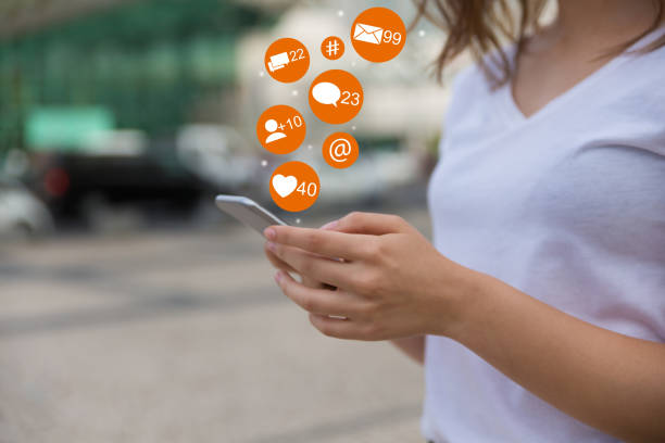 istock Closeup shot of female hands using smartphone 1211909241