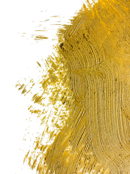 istock Gold paint texture and brush stroke on white background 1211917266
