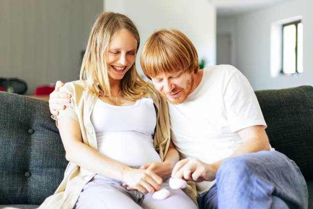 istock Happy couple expecting daughter 1211921795