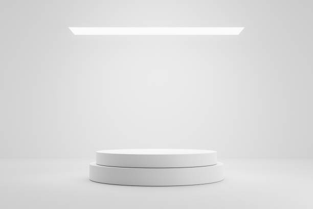 istock Empty pedestal or podium display on white room and light background with futuristic stand concept. Blank product shelf standing backdrop. 3D rendering. 1211924106