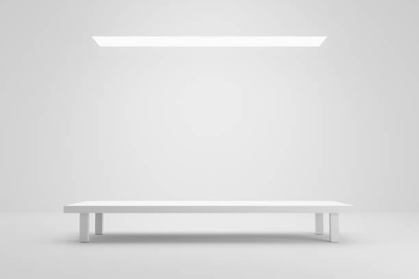 istock Empty pedestal or table podium display on white room and light background with futuristic stand concept. Blank product shelf standing backdrop. 3D rendering. 1211924125