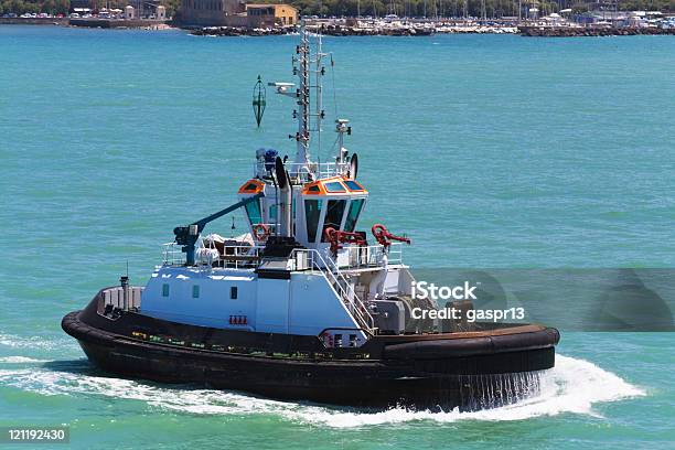 Tugboat Stock Photo - Download Image Now - Assistance, Breaking Wave, Color Image