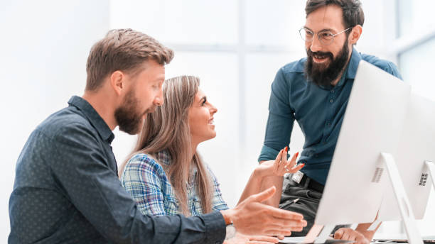 istock business team discussing business plan at office meeting 1211924804
