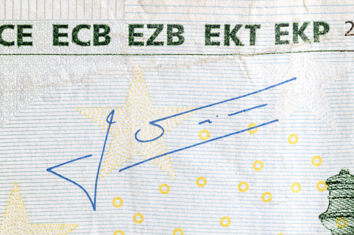 Jean-Claude Trichet's signature on 100 Euro banknote. Mario Draghi is president of the European Central Bank.