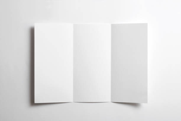 istock Blank opened tri fold flyer brochure isolated on white as template for design presentation, showcase, etc. 1211926620