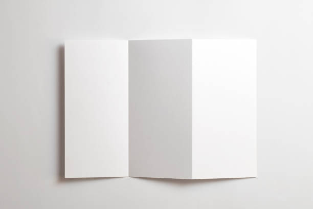 istock Blank opened tri fold flyer brochure isolated on white as template for design presentation, showcase, etc. 1211927286