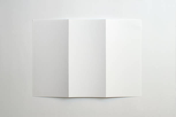 istock Blank opened tri fold flyer brochure isolated on white as template for design presentation, showcase, etc. 1211927365