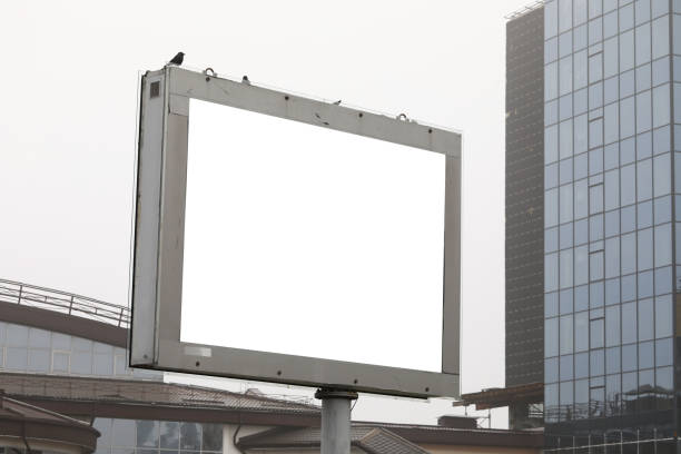 istock Large billboard with blank screen installed street 1211932832