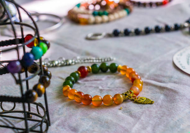 istock Colorful decoration and jewelry on a white table 1211943290