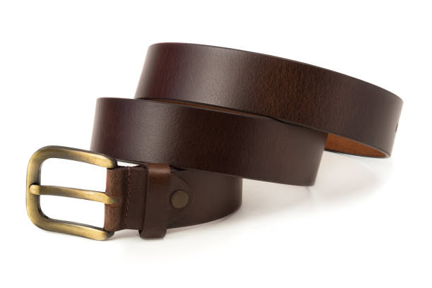 istock Brown leather belt with buckle isolated on white background. 1211944176
