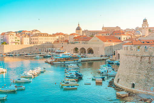 Dubrovnik fortress panorama and harbor with boats and luxury yachts,Dalmatia,Croatia,Europe