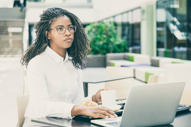 istock Pensive businesswoman thinking over ideas for project 1211948031