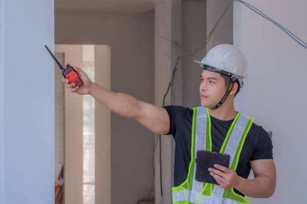 istock Portrait of handsome foreman construction worker on a construction site. 1211948547