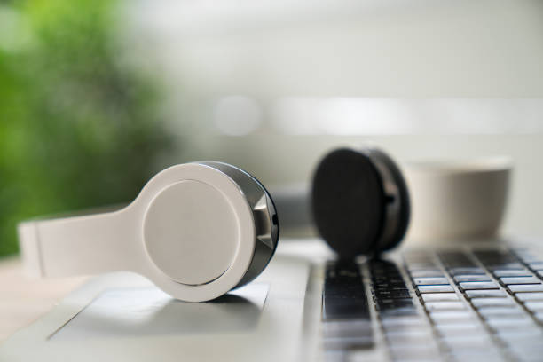 white headphones and laptop.