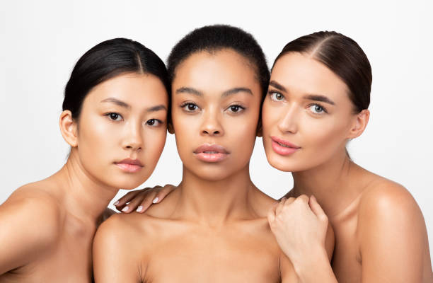 istock Three Mixed Girls Looking At Camera Posing Naked, Studio Shot 1211951238