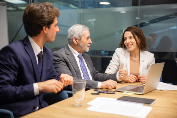 istock Confident business team working at office 1211952184