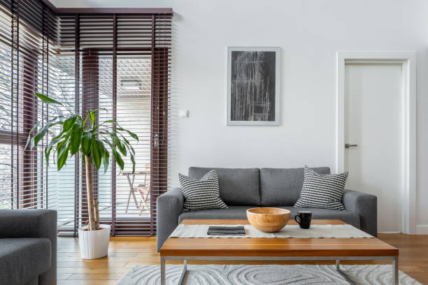 istock Stylish living room with big windows 1211952466