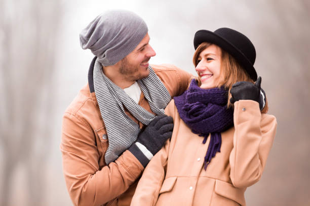 istock Couple enjoying outdoors in cold autumn / winter time. 1211952522