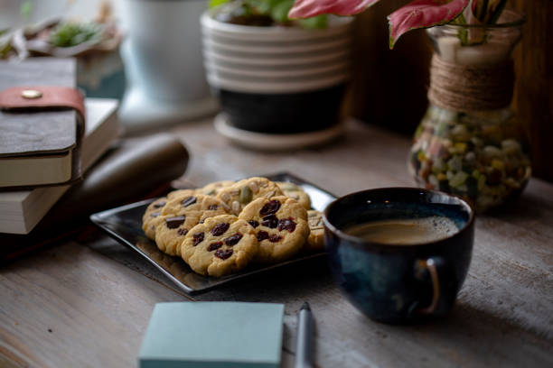 istock home baked cookies and coffee break 1211953908