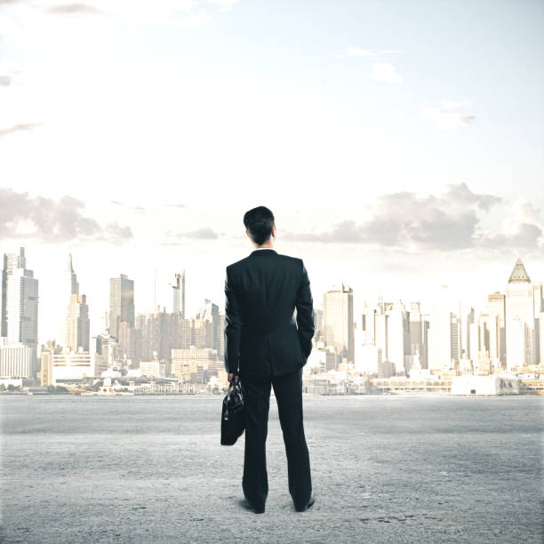 istock Businessman with suitcase 1211955648
