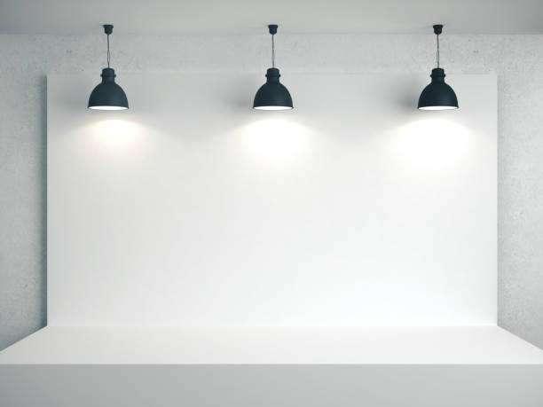 istock White room with blank poster on wall 1211956172