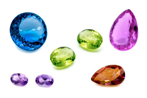 istock Precious and semiprecious gems on a white 1211956696
