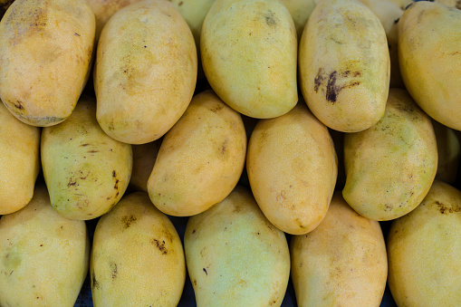 Full frame Mango tropical fruit in line on street market in Kuala Lumpur