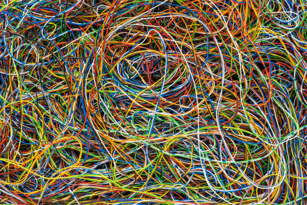 istock Network Chaos Of Colorful Electrical and Telecommunication Cables 1211960722