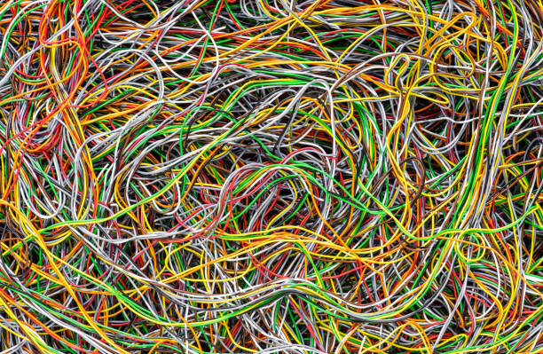 istock Network Chaos Of Colorful Electrical and Telecommunication Cables 1211961023