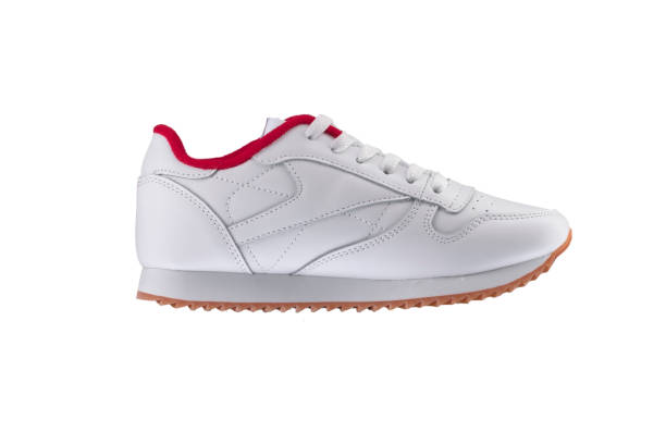 istock Sport shoes. White sneaker with a red insert on a white background. 1211961099
