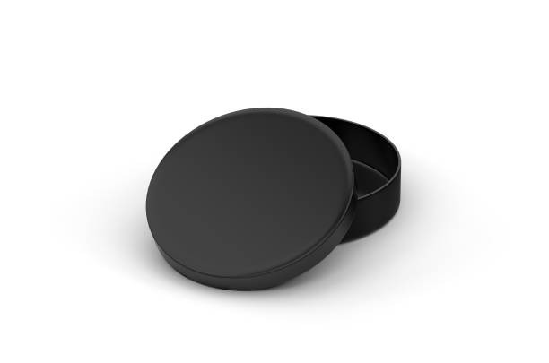 istock Round black cardboard packaging box mock up template on isolated white background, 3d illustration 1211961817