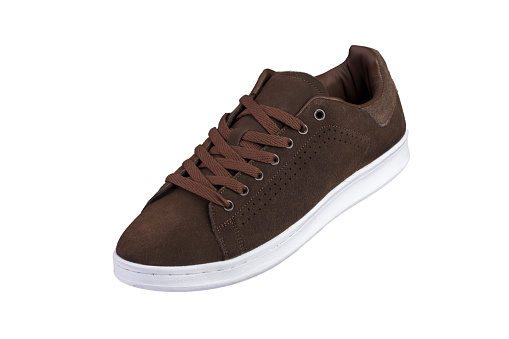 Sport shoes. Brown sneaker on a white background. Shoe.