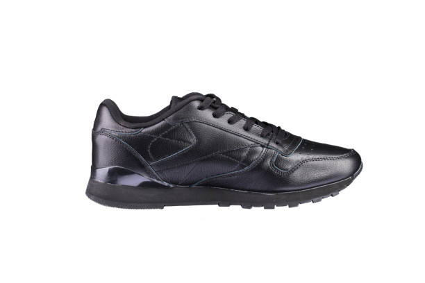istock Sport shoes. Black sneaker on a white background. Shoe. 1211963368