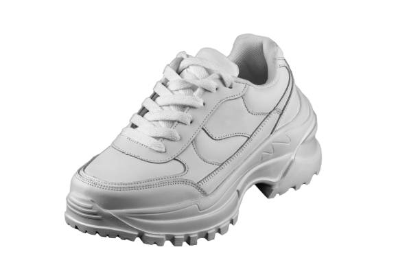 istock White women's leather sneaker with a massive sole. 1211963564