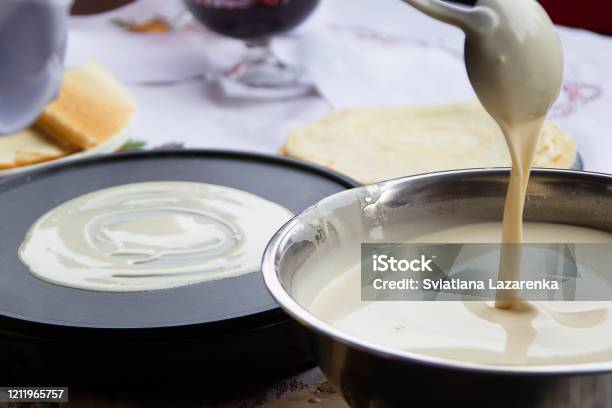 Cooking Pancakespour Dough For Pancakes Into A Frying Pan Stock Photo - Download Image Now
