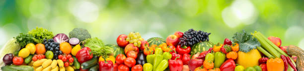 istock Panorama multicolored fresh fruits and vegetables 1211968046