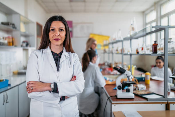 istock Female teacher in laboratory classroom 1211968296