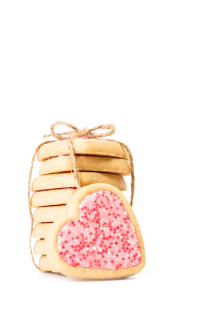 istock Heart shape cookies with a red and white checkered ribbon 1211968462