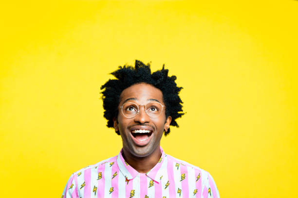 istock Excited young man wearing vintage shirt 1211969122