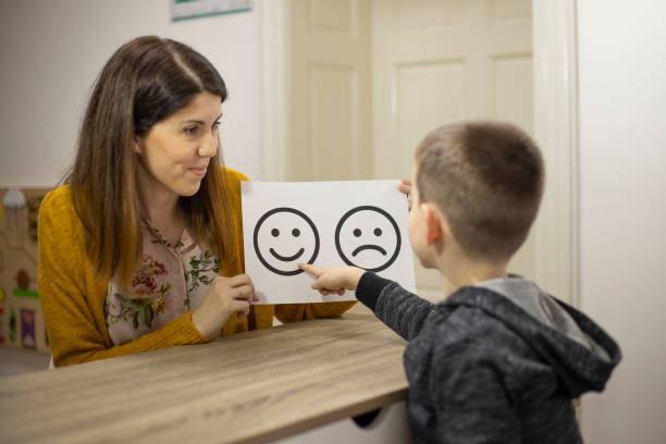 istock Emotion emoticons used by a psychologist during a therapy session 1211970201