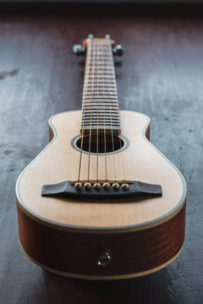 istock Small Guitar for travelers 1211970225