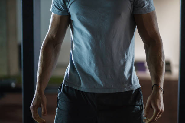 istock Unrecognizable muscular young man after his workout 1211973370