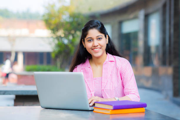 istock Student Sitting On Campus stock photo 1211974782