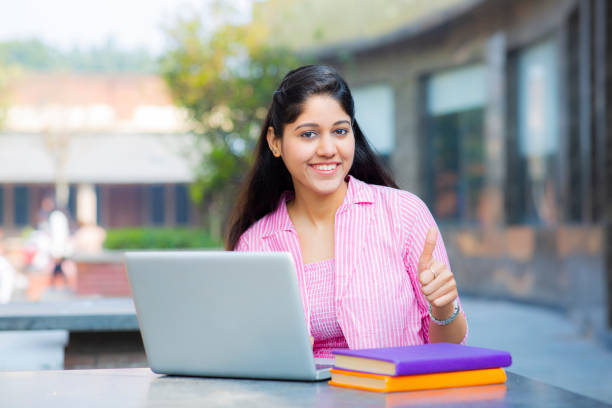 istock Student Sitting On Campus stock photo 1211974828