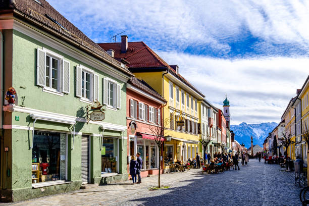 old town of murnau am staffelsee Murnau, Germany - March 8: some people visiting the famous old town called untermarkt on March 8, 2020 in murnau, Germany lake staffelsee photos stock pictures, royalty-free photos & images