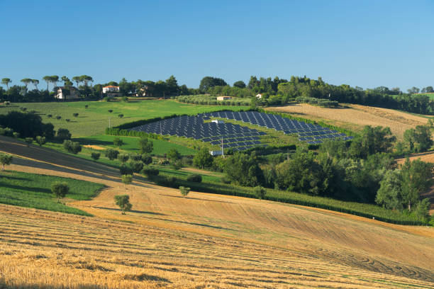 Rural landscape near Macerata, Marches, Italy Rural landscape at summer near Macerata, Marches, Italy. Solar panels macerata italy stock pictures, royalty-free photos & images