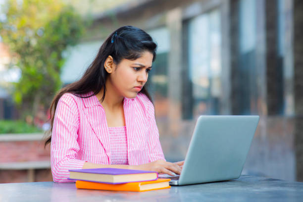 istock Student Sitting On Campus stock photo 1211976029