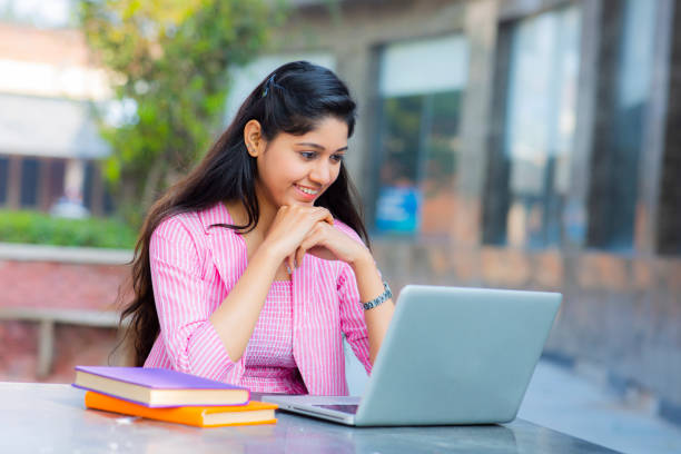 istock Student Sitting On Campus stock photo 1211976210