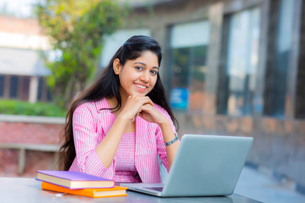 istock Student Sitting On Campus stock photo 1211976241