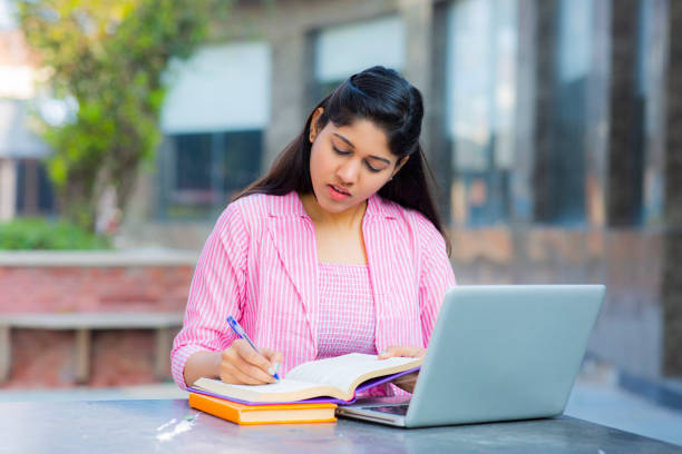 istock Student Sitting On Campus stock photo 1211976329
